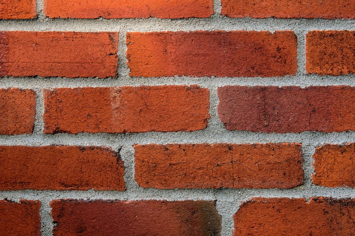 Joints de mortier entre les briques d'un mur de façade
